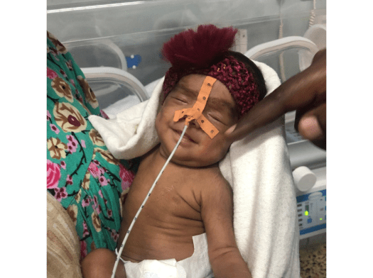 A smiling baby in the NICU at Mazar-i-Sharif hospital in Balkh province, Afghanistan.