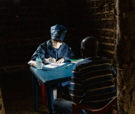 Dr Tathy, an MSF doctor, sees patients considered as non-Ebola suspects in consultation, as part of the mobile intervention clinic and training of local medical staff in the Ebola context, in the village of Bobua. 